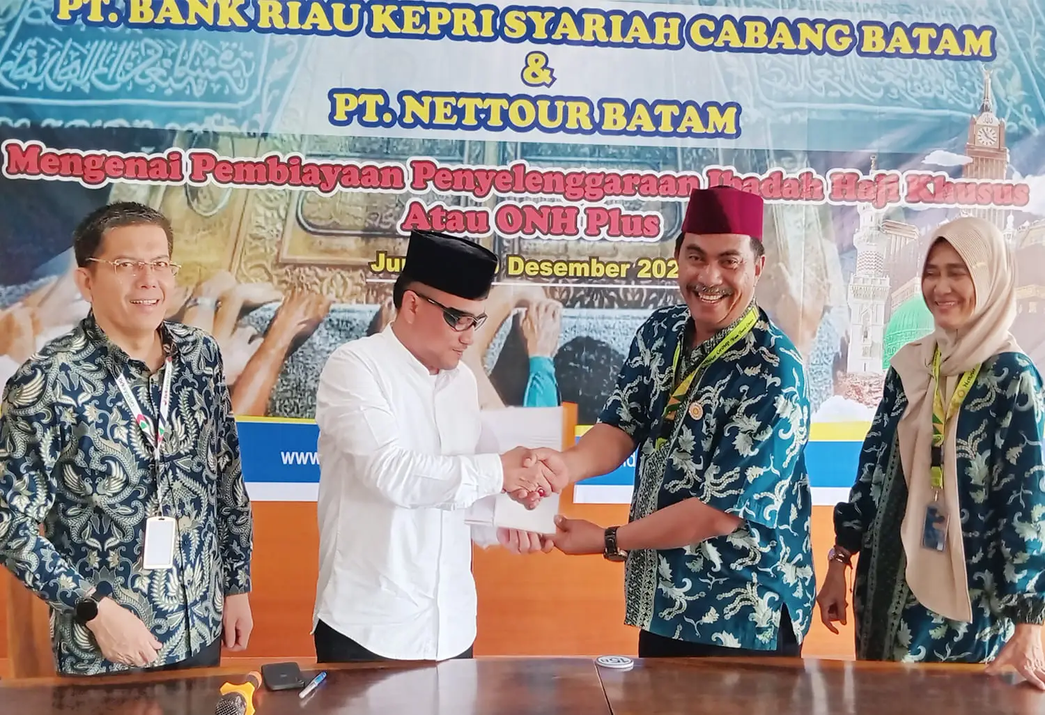 Kerja Sama Nettour Batam dan Bank Riau Kepri Syariah